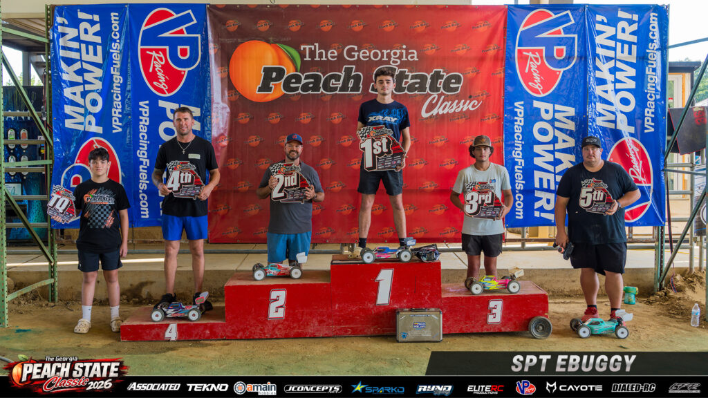 Sportsman EBuggy top five and the top qualifier holding awards on the podium at the 2026 Georgia Peach State Classic.