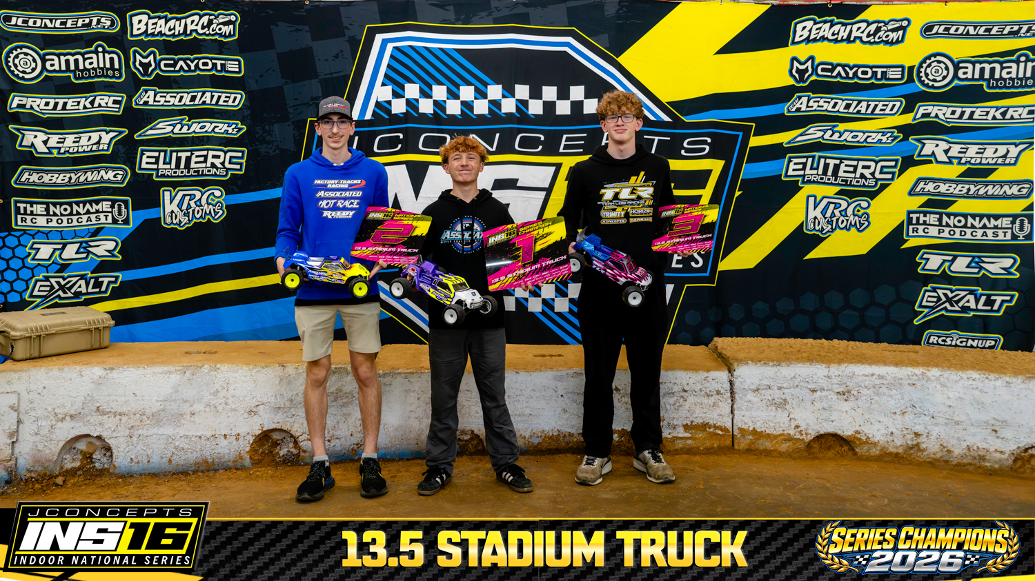 13.5 Stadium Truck INS16 2026 Champions holding RC vehicles and series awards.