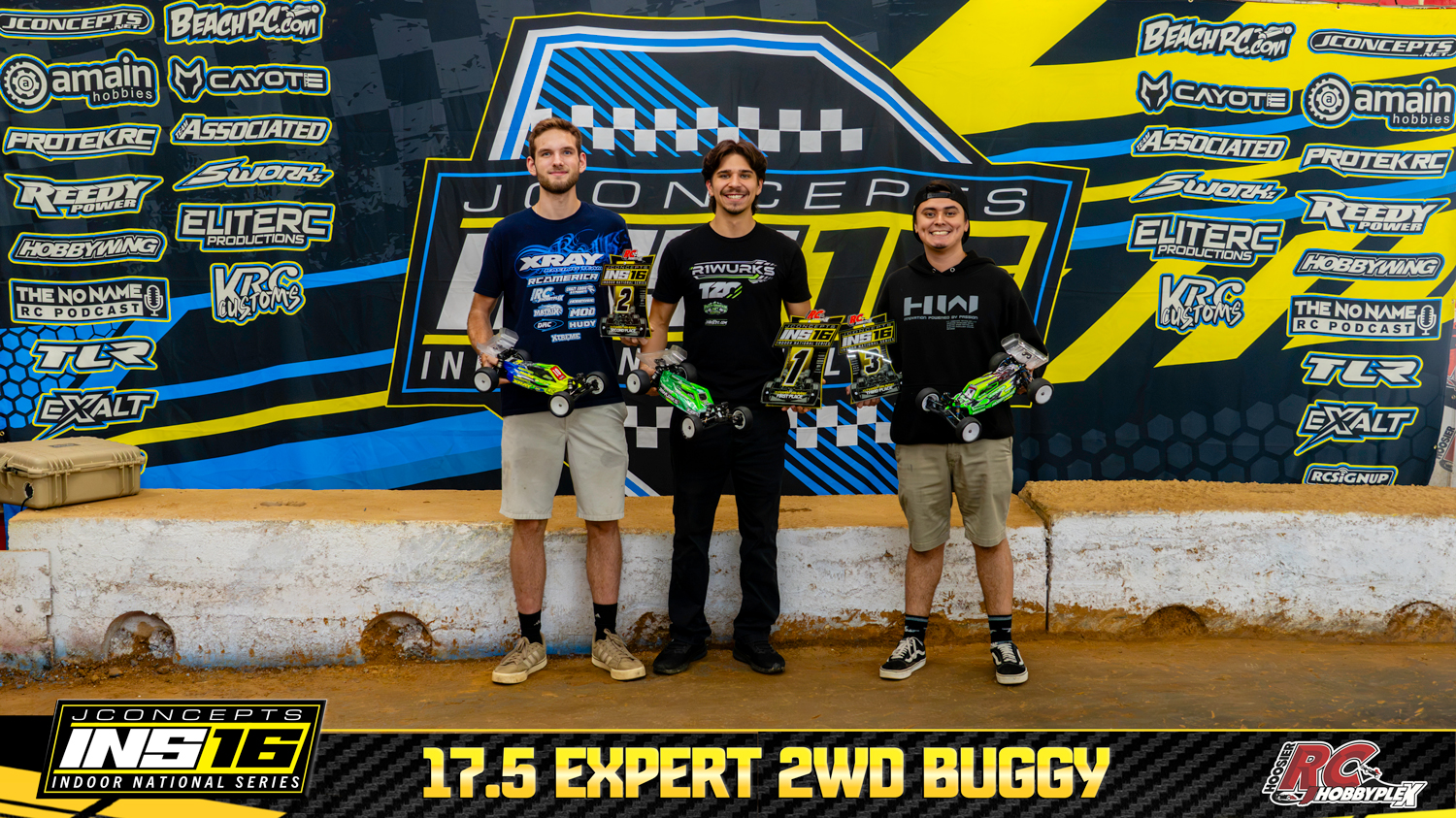17.5 Expert 2WD Buggy round winners holding RC vehicles and podium awards at the 2026 JConcepts INS16 Finals at Hoosier RC Hobbyplex.