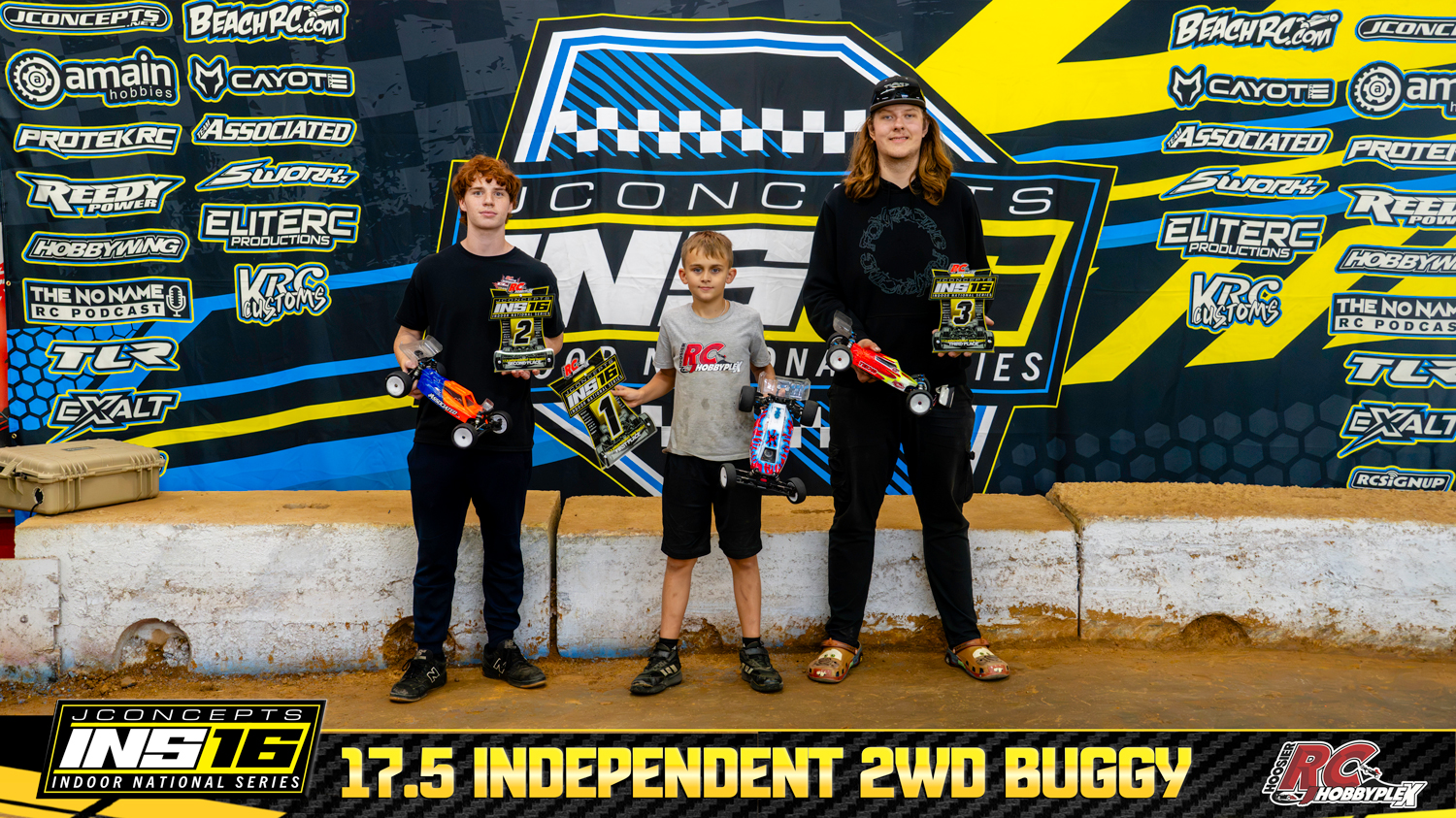 17.5 Independent 2WD Buggy round winners holding RC vehicles and podium awards at the 2026 JConcepts INS16 Finals at Hoosier RC Hobbyplex.