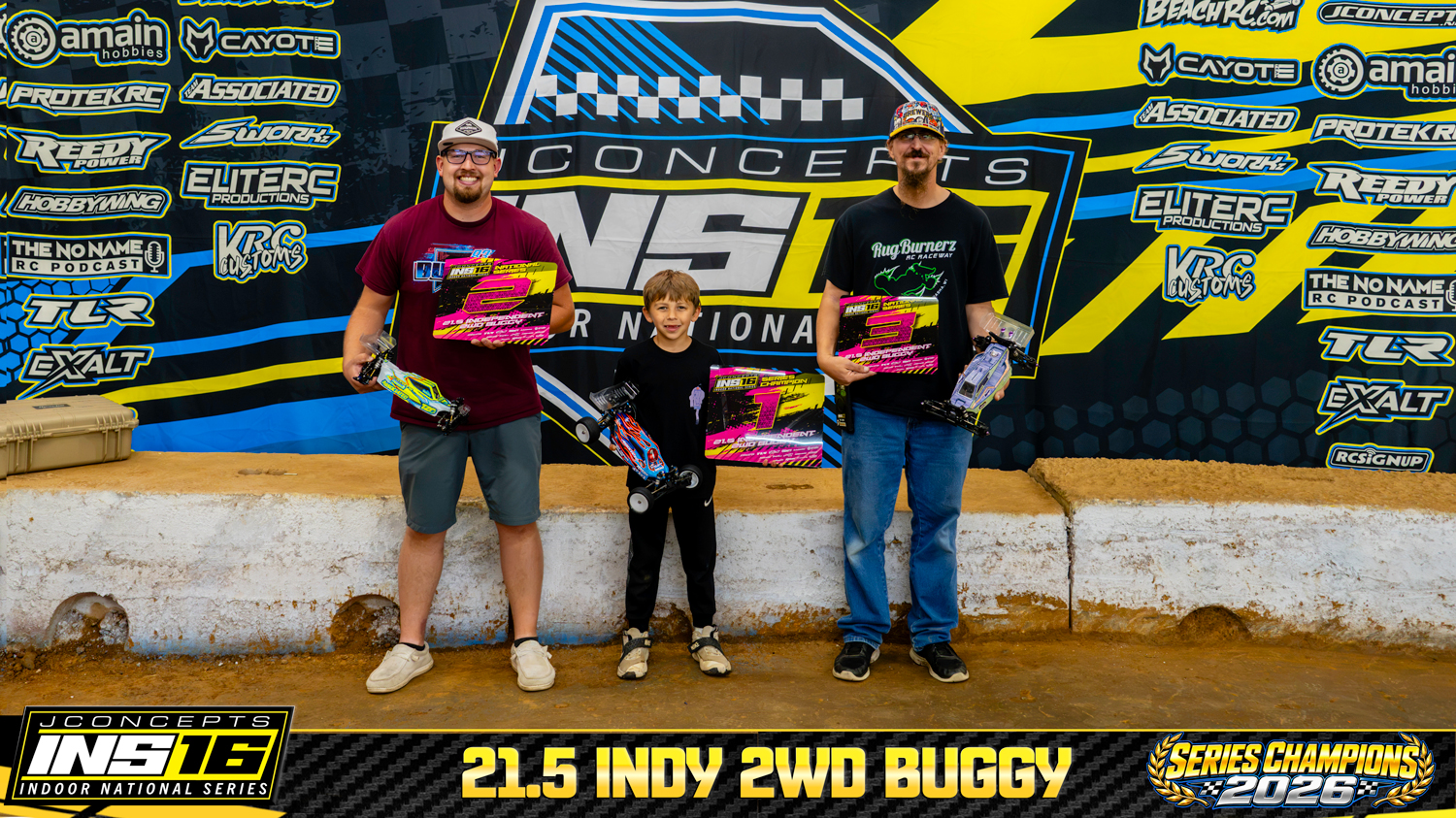 21.5 Indy 2WD Buggy INS16 2026 Champions holding RC vehicles and series awards.
