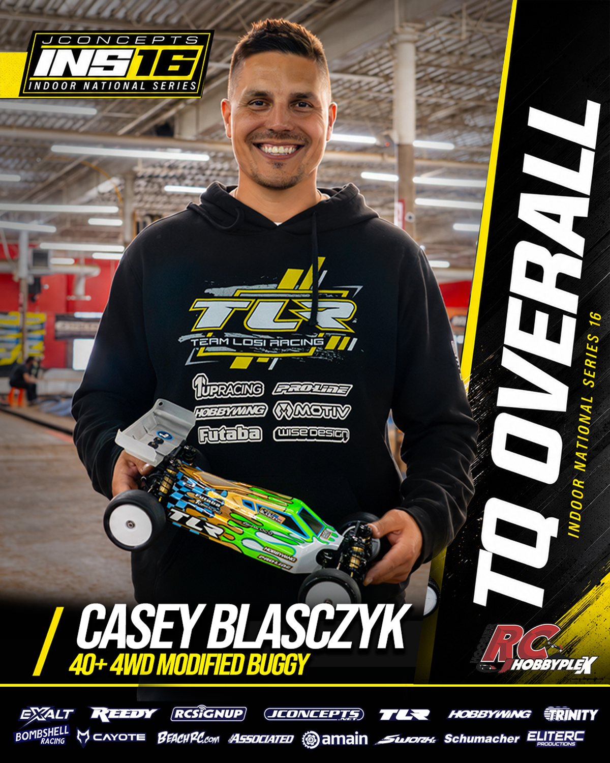 Casey Blasczyk, 40+ 4WD Modified Buggy TQ Overall, holding an RC vehicle at the 2026 JConcepts INS16 Finals at Hoosier RC Hobbyplex.